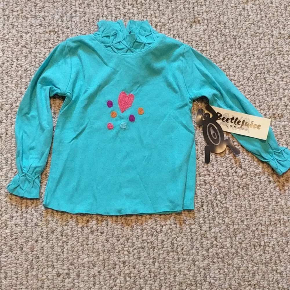 Darling girls turtleneck w/ruching on cuffs & neck